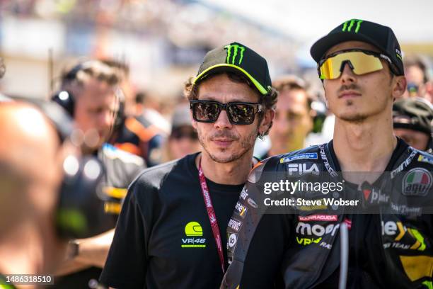 Former MotoGP rider and MotoGP legend Valentino Rossi of Italy and Luca Marini of Italy and Mooney VR46 Racing Team on the starting grid during the...