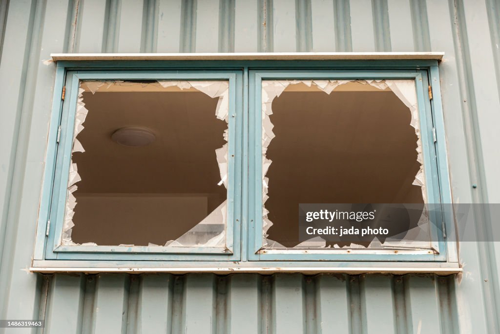 Window frame with two broken windows