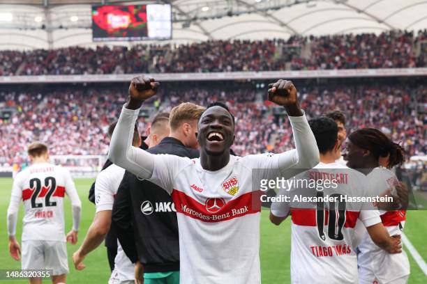 Silas Katompa Mvumpa celebrates after Tanguy Coulibaly scores their sides second goal from the penalty spot during the Bundesliga match between VfB...