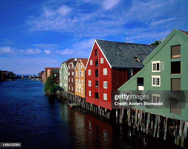 very picturesque houses along the nidelua river in old trondheim. - trondheim norway stock pictures, royalty-free photos & images