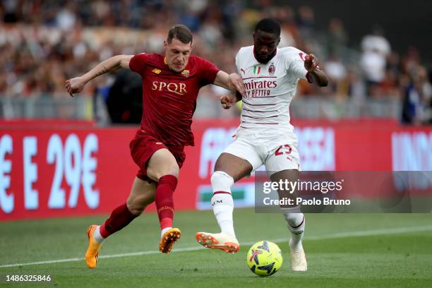 Andrea Belotti of AS Roma battles for possession with Fikayo Tomori of AC Milan during the Serie A match between AS Roma and AC MIlan at Stadio...