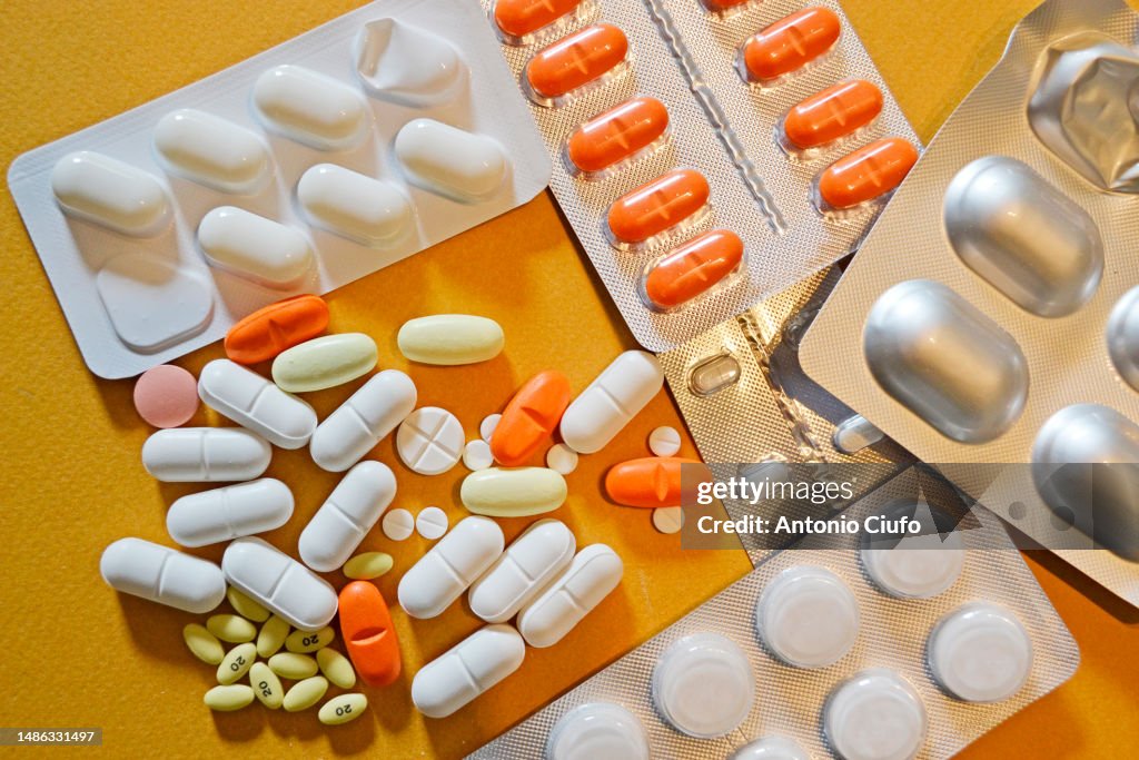 Variety of medicines in pill form, vitamins and dietary supplements