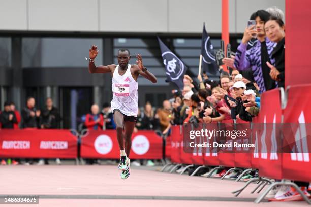 Edwin Kiprop Kiptoo of Kenya reacts as they cross the finish line in the Men's 21.1km race during the Adizero: Road To Records 2023 on April 29, 2023...
