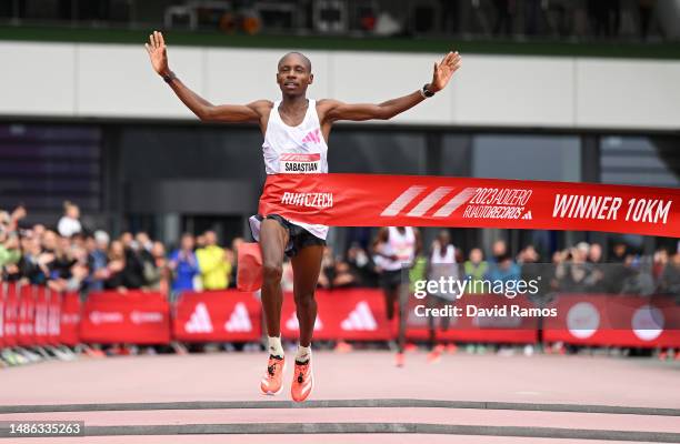 Sabastian Sawe of Kenya celebrates as they cross the finish line to win the Men's 10km race during the Adizero: Road To Records 2023 on April 29,...