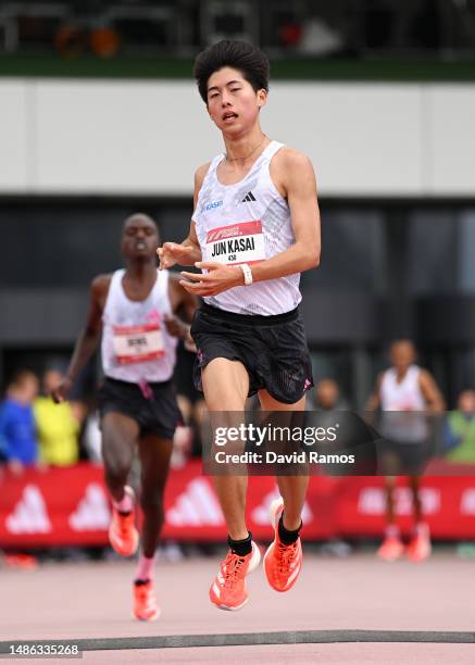 Jun Kasai of Japan crosses the finish line in the Men's 10km race during the Adizero: Road To Records 2023 on April 29, 2023 in Herzogenaurach,...