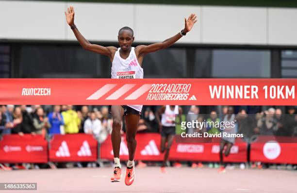 Sabastian Sawe of Kenya celebrates as they cross the finish line to win the Men's 10km race during the Adizero: Road To Records 2023 on April 29,...