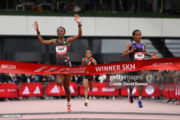 Medina Eisa of Ethiopia crosses the finish line to win the Women's 5km race during the Adizero: Road To Records 2023 on April 29, 2023 in...