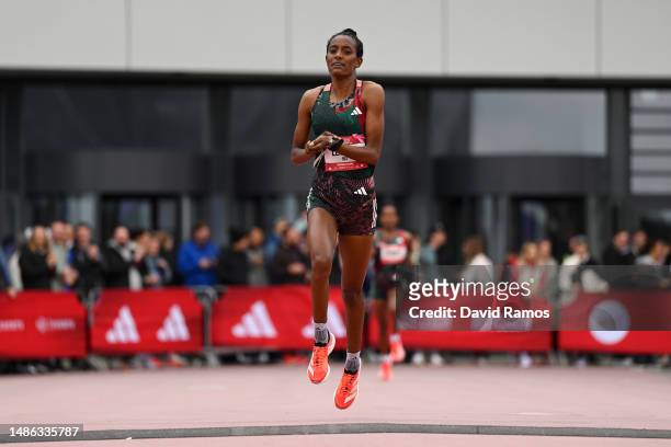 Lemlem Nibret of Ethiopia crosses the finish line in the Women's 5km race during the Adizero: Road To Records 2023 on April 29, 2023 in...