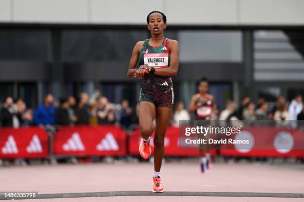 Yalemget Yaregal of Ethiopia crosses the finish line in the Women's 5km race during the Adizero: Road To Records 2023 on April 29, 2023 in...