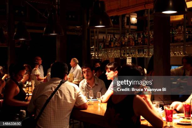 tapas bar inside mercado de san miguel (san miguel market). - madrid tapas stock pictures, royalty-free photos & images