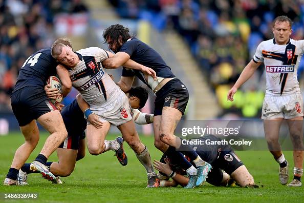 Mpc Rugby Morgan Smithies of England is tackled by Ugo Tison and Paul Marcon of ...
