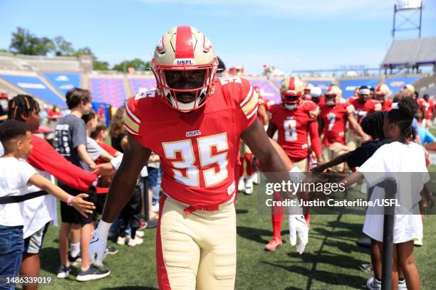 Rashad Smith of Birmingham Stallions gives fans high fives prior to the game against the New Orleans Breakers at Protective Stadium on April 29, 2023...