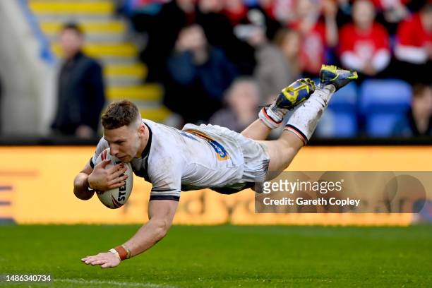 George Williams of England scores the team's tenth try during the Mid-Season Rugby League International match between England and France at The...