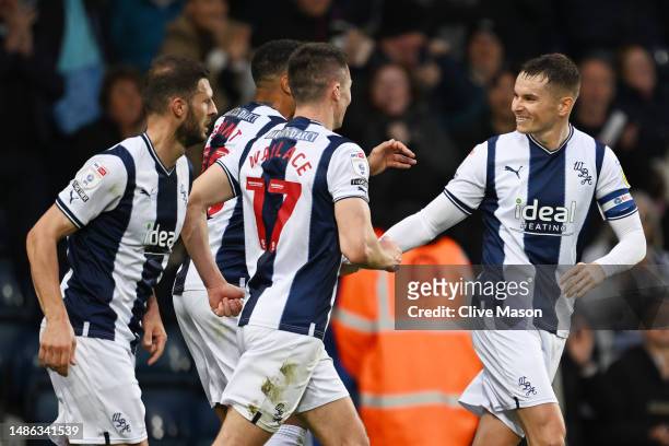 Conor Townsend of West Bromwich Albion celebrates with team mates after scoring their sides first goal during the Sky Bet Championship between West...