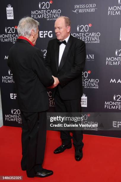 Costa-Gavras and Prince Albert II of Monaco attend the 20th Monte-Carlo Film Festival De La Comedie at Grimaldi Forum on April 29, 2023 in Monaco,...