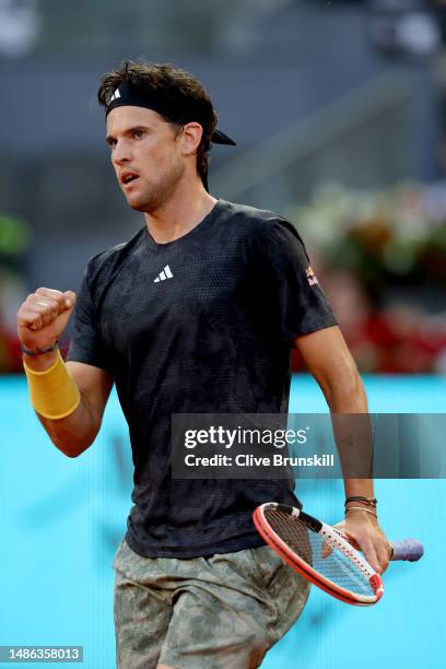 Dominic Thiem of Austria celebrates against Stefanos Tsitsipas of Greece during the Men's Round of 64 match on Day Six of the Mutua Madrid Open at La...