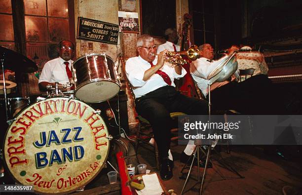 jazz band playing in preservation hall in vieux carre. - new orleans band stock pictures, royalty-free photos & images
