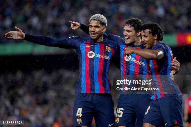 Andreas Christensen of FC Barcelona celebrates with teammates Ronald Araujo and Jules Kounde of FC Barcelona after scoring the team's first goal...