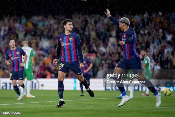 Andreas Christensen of FC Barcelona celebrates with teammate Ronald Araujo after scoring the team's first goal during the LaLiga Santander match...