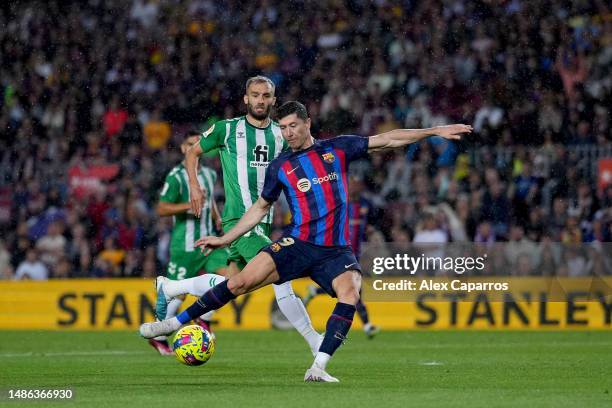 Robert Lewandowski of FC Barcelona scores the team's second goal during the LaLiga Santander match between FC Barcelona and Real Betis at Spotify...