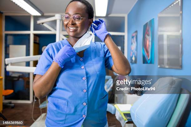 black woman love her job in medical clinic - dental office front stock pictures, royalty-free photos & images