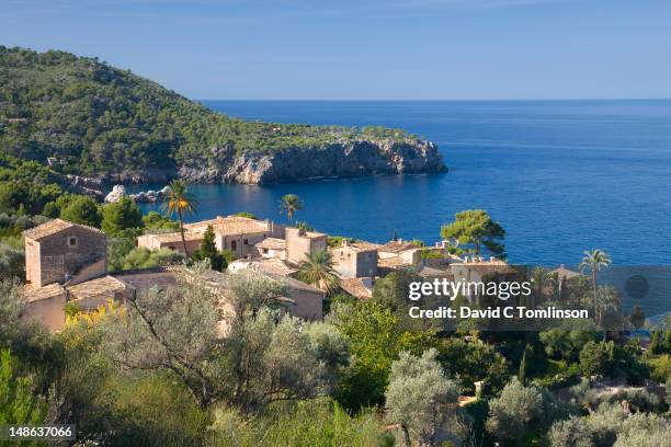 tiny hamlet of llucalcari, perched high above the mediterranean near deia. - majorca ストックフォトと画像