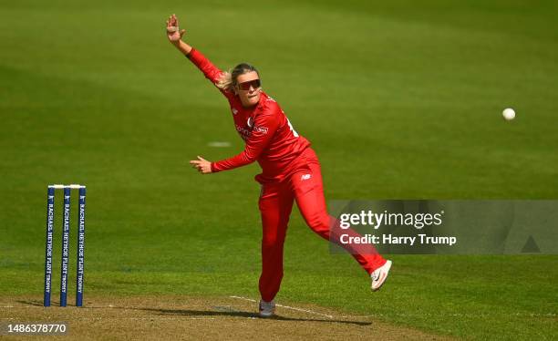 Alex Hartley of Thunder in bowling action during the Rachael Heyhoe Flint Trophy match between Western Storm and Thunder at Sophia Gardens on April...