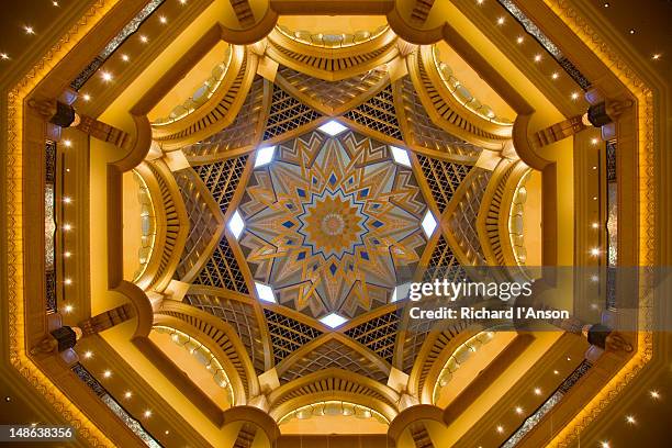 interior of emirates palace hotel. - emirates palace stock pictures, royalty-free photos & images