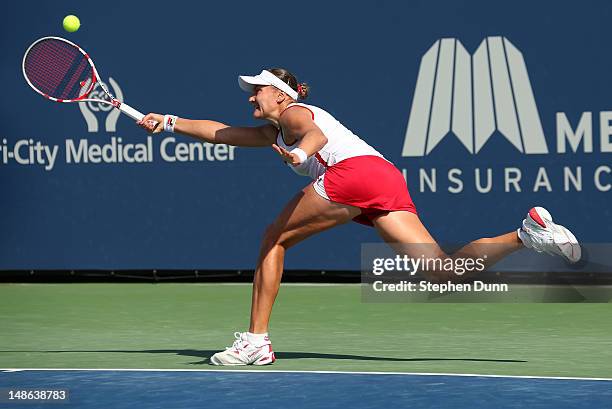 Nadia Petrova of Russia chases a shot from Alexa Glatch during day five of the Mercury Insurance Open Presented By Tri-City Medical at La Costa...