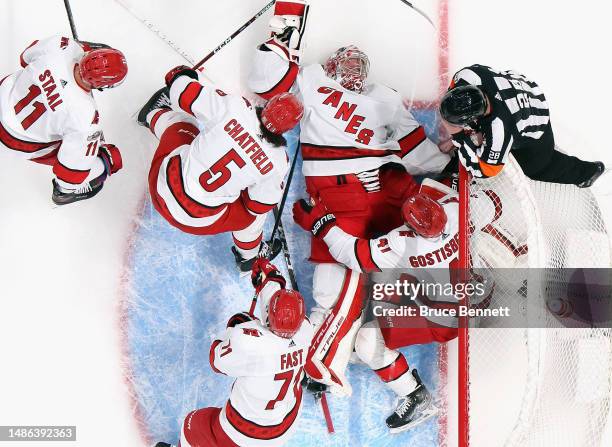 Frederik Andersen of the Carolina Hurricanes makes the first period save on Anders Lee of the New York Islanders in Game Six of the First Round of...