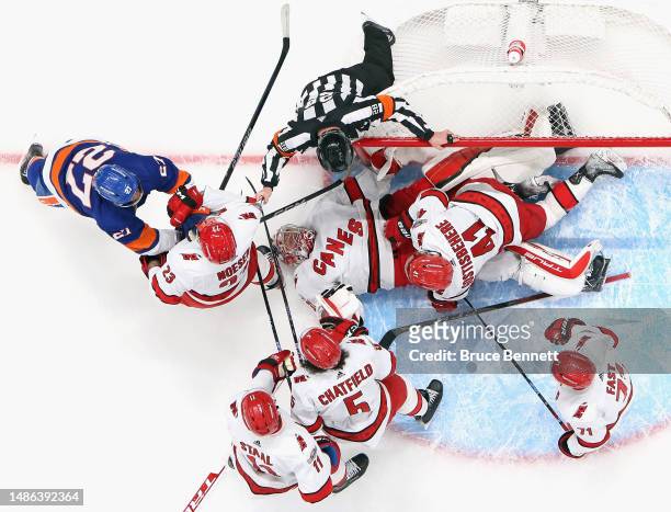 Frederik Andersen of the Carolina Hurricanes makes the first period save on Anders Lee of the New York Islanders in Game Six of the First Round of...