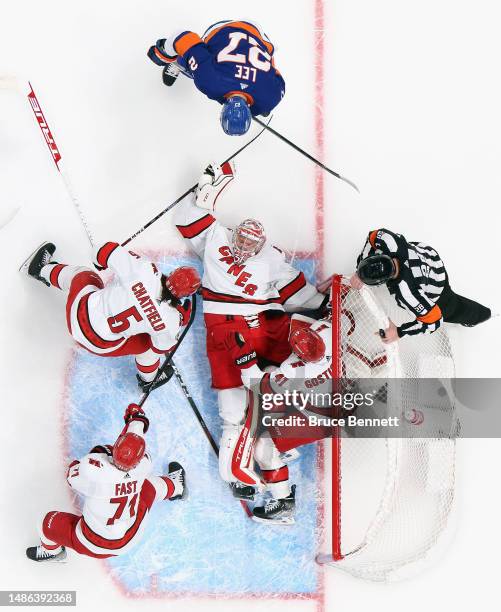 Frederik Andersen of the Carolina Hurricanes makes the first period save on Anders Lee of the New York Islanders in Game Six of the First Round of...