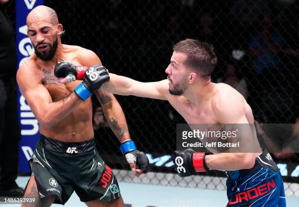 Cody Durden punches Charles Johnson in a flyweight fight during the UFC Fight Night event at UFC APEX on April 29, 2023 in Las Vegas, Nevada.