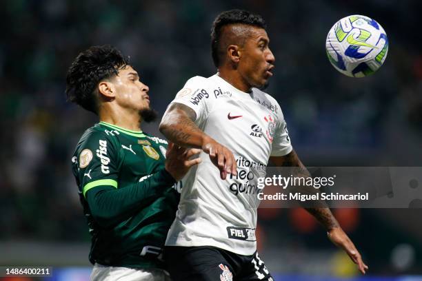 Paulinho of Corinthians fights for the ball against Gustavo Gomez of Palmeiras during a match between Palmeiras and Corinthians as part of...