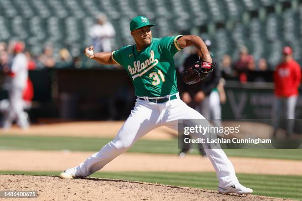 Jeurys Familia of the Oakland Athletics pitches in the top of the ninth inning against the Cincinnati Reds at RingCentral Coliseum on April 29, 2023...