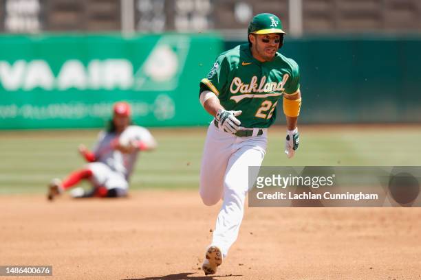 Ramon Laureano of the Oakland Athletics runs to third base in the bottom of the second inning against the Cincinnati Reds at RingCentral Coliseum on...