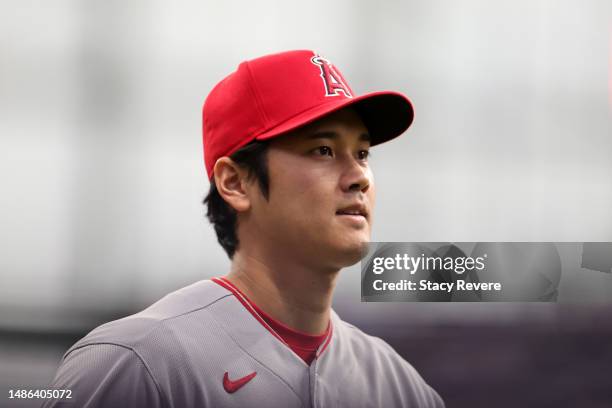 Shohei Ohtani of the Los Angeles Angels walks to the dugout prior to a game against the Milwaukee Brewers at American Family Field on April 29, 2023...