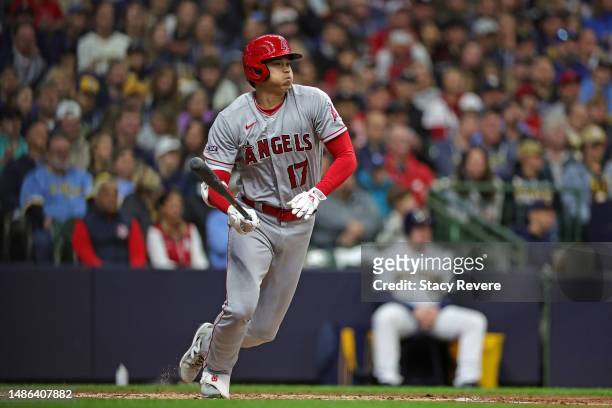 Shohei Ohtani of the Los Angeles Angels runs to first base during the third inning against the Milwaukee Brewers at American Family Field on April...