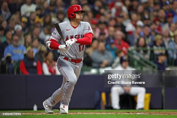 Shohei Ohtani of the Los Angeles Angels runs to first base during the third inning against the Milwaukee Brewers at American Family Field on April...