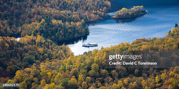view from summit of ben a'an to loch katrine and historic steamship sir walter scott in autumn. - steam liner stock pictures, royalty-free photos & images