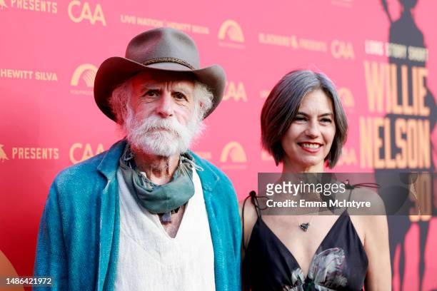 Bob Weir and Natascha Münter attend the "Long Story Short: Willie Nelson 90" Concert Celebrating Willie's 90th Birthday, presented by Blackbird, at...
