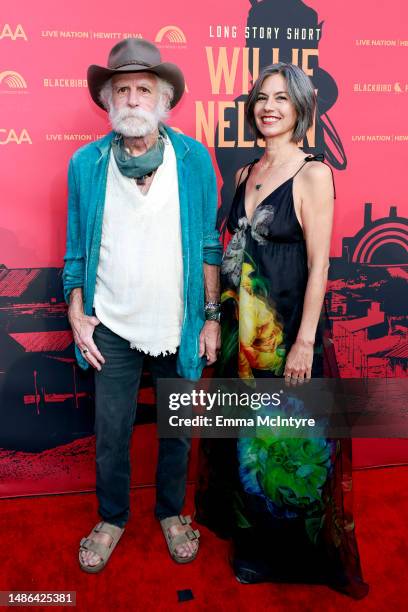 Bob Weir and Natascha Münter attend the "Long Story Short: Willie Nelson 90" Concert Celebrating Willie's 90th Birthday, presented by Blackbird, at...