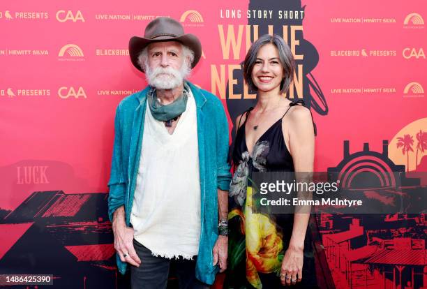 Bob Weir and Natascha Münter attend the "Long Story Short: Willie Nelson 90" Concert Celebrating Willie's 90th Birthday, presented by Blackbird, at...