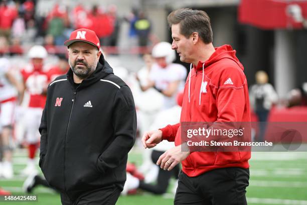 Head coach Matt Rhule of Nebraska Cornhuskers and athletic director Trev Albers on the field at Memorial Stadium on April 22, 2023 in Lincoln,...