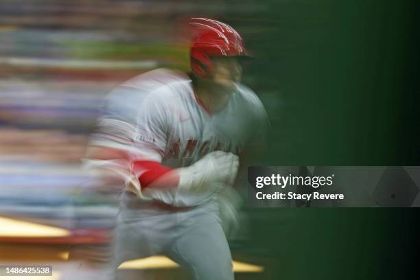 Shohei Ohtani of the Los Angeles Angels runs to first base during the eighth inning against the Milwaukee Brewers at American Family Field on April...