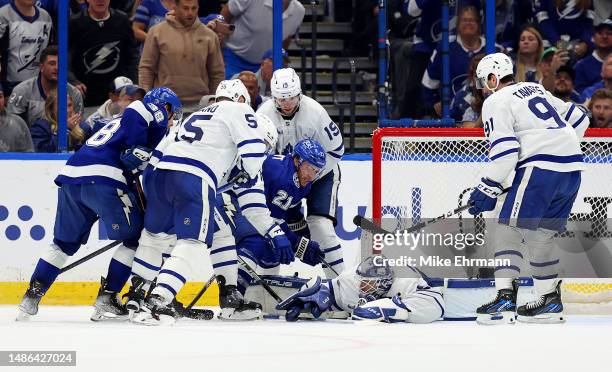 Ilya Samsonov of the Toronto Maple Leafs makes a save against Brayden Point of the Tampa Bay Lightning in the third period during Game Six of the...