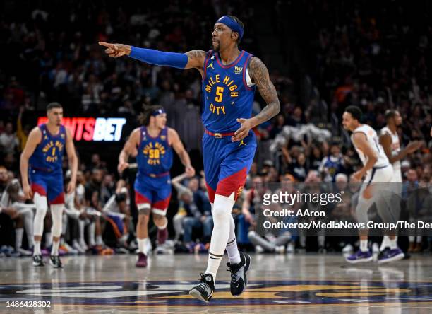 Kentavious Caldwell-Pope of the Denver Nuggets celebrates scoring against the Phoenix Suns during the second quarter at Ball Arena in Denver on...
