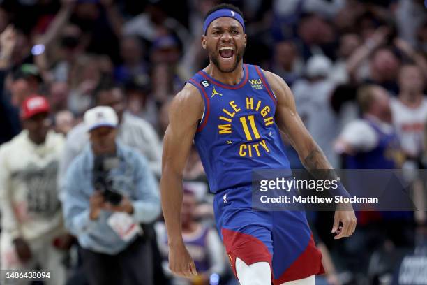 Bruce Brown of the Denver Nuggets reacts after a dunk against the Phoenix Suns in the fourth quarter at Ball Arena on April 29, 2023 in Denver,...
