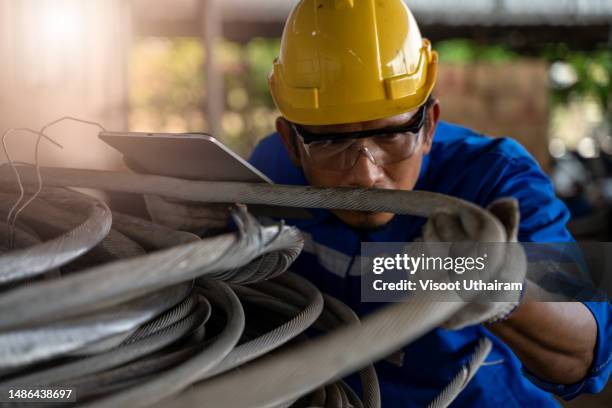 industrial steel cable or wire,industrial tools,industrial concept. - stahlkabel stock-fotos und bilder