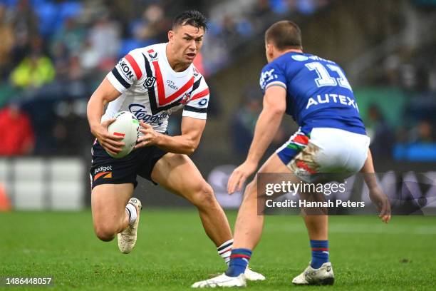 Joseph Manu of the Roosters attacks during the round nine NRL match between New Zealand Warriors and Sydney Roosters at Mt Smart Stadium on April 30,...